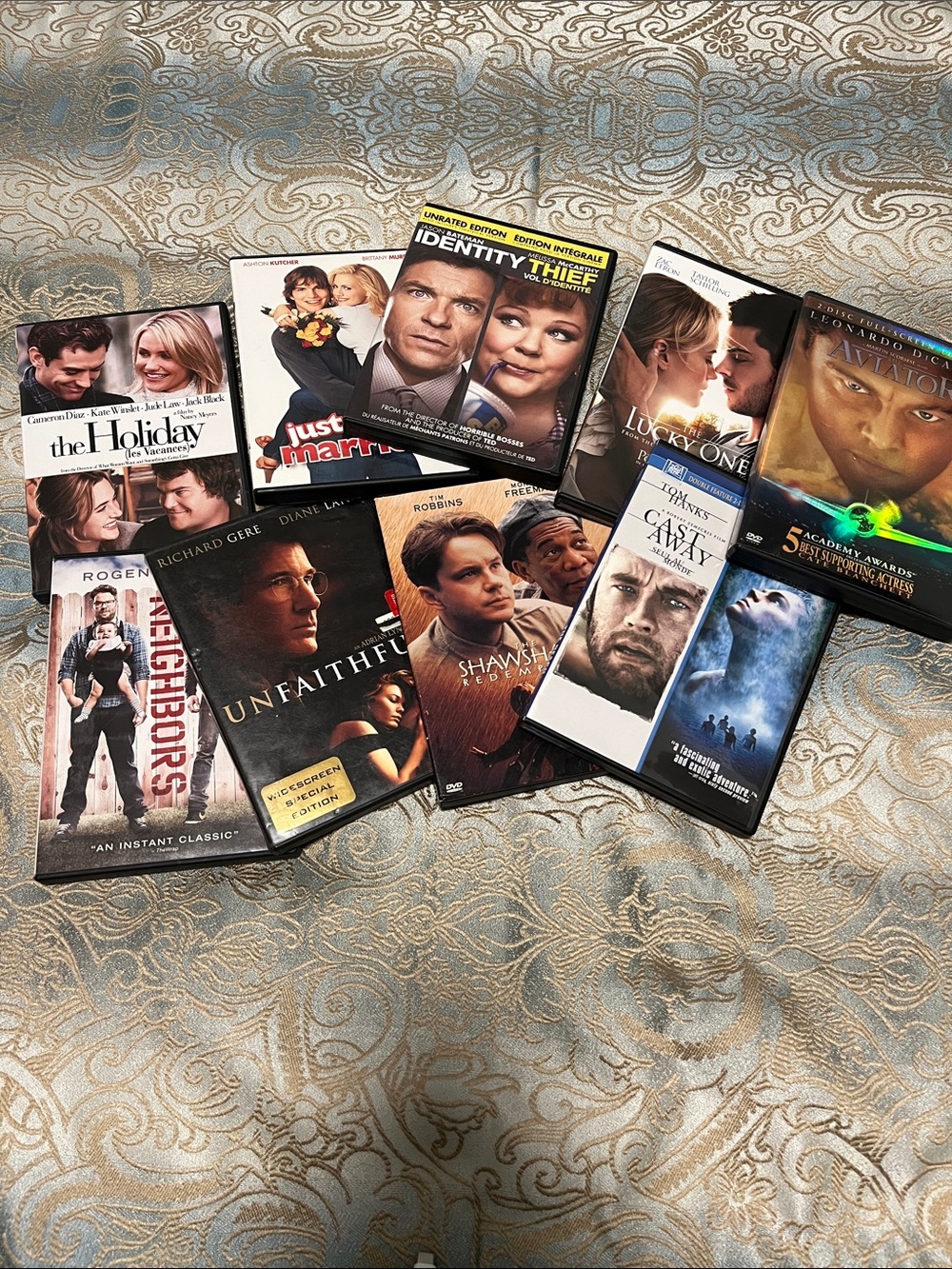 10 dvd movies. As shown in pics. 2 different movies in the cast away one